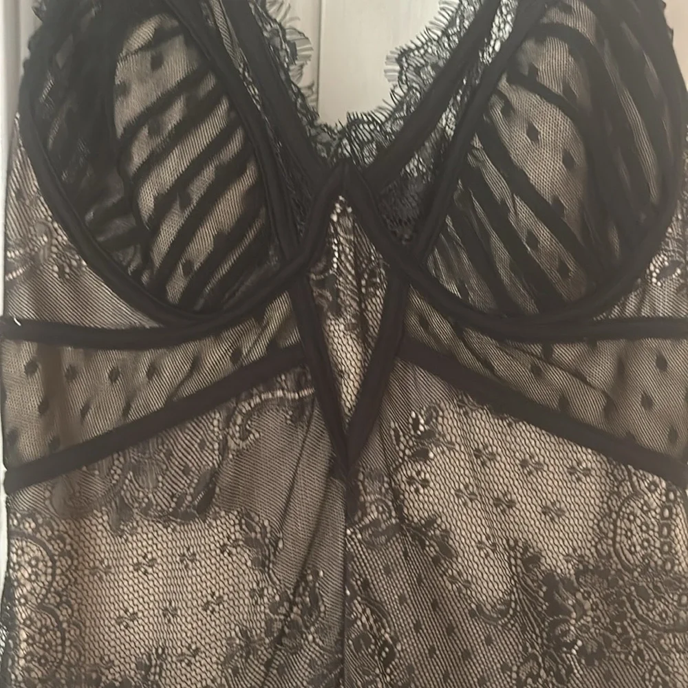 Bebe size small Lacey black tight dress. Zipper works. Never been worn! - Picture 2 of 5